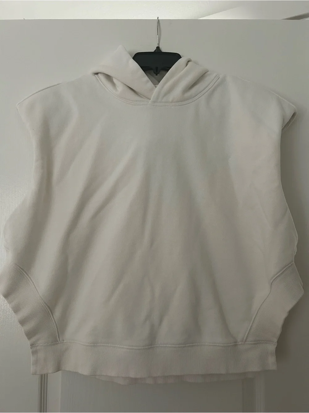 ALO Yoga Sleeveless Hooded Pullover in Light Cream